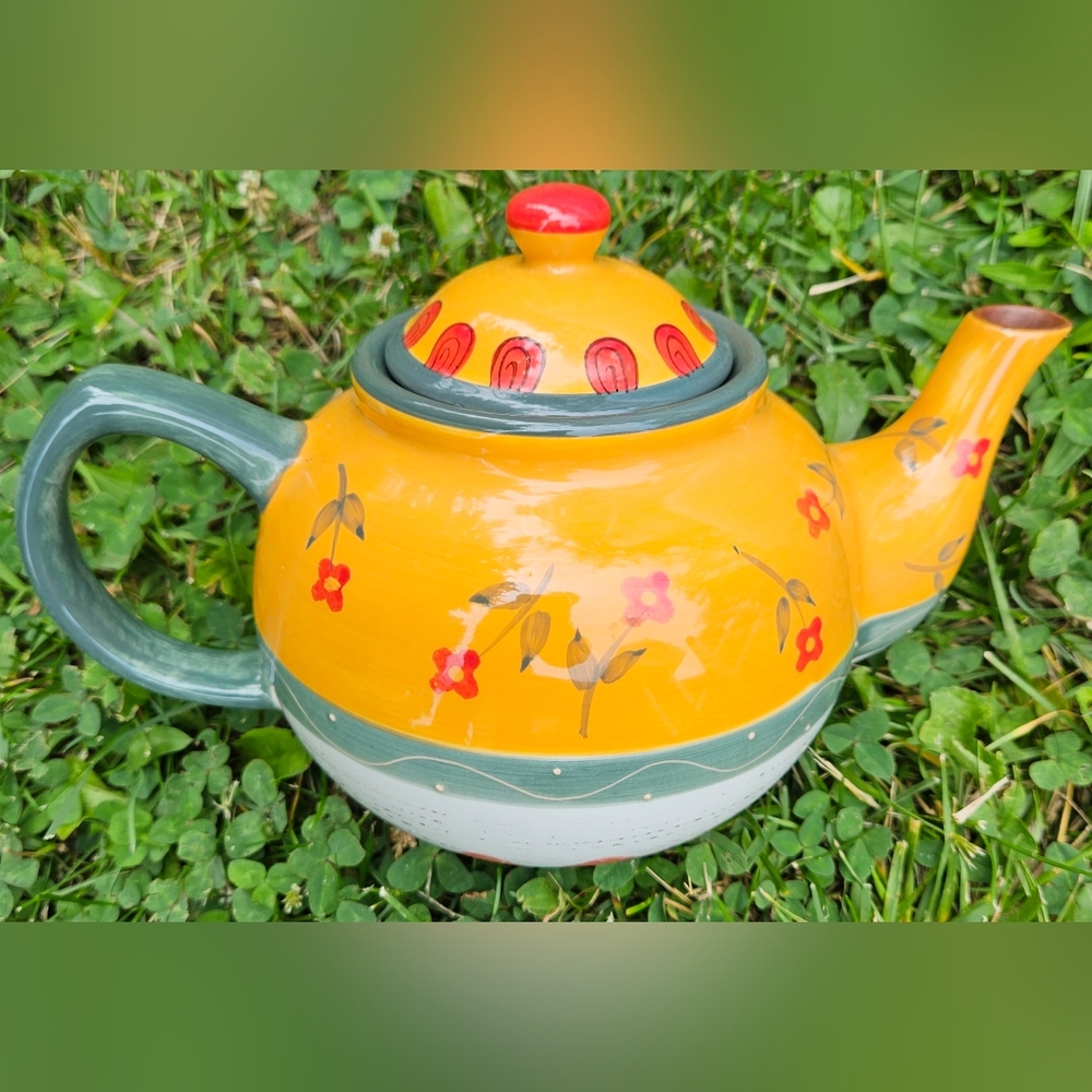 Folk art decorative floral yellow, green, red tea pot (gd)